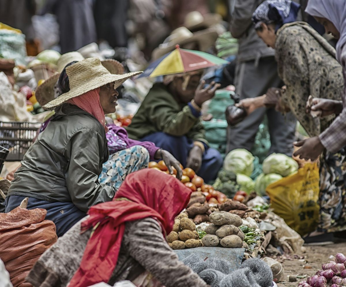Shoppers and sellers at a vegetable market in Addis Ababa
