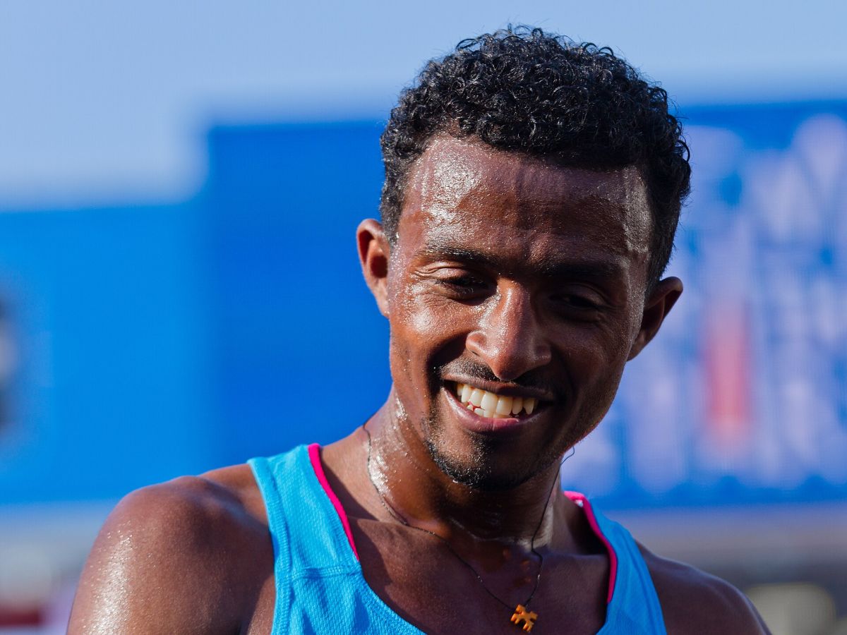 An Ethiopian runner smiling after a race